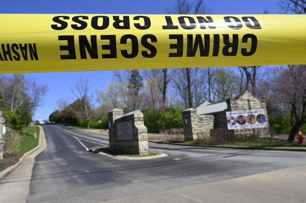 FILE - A police crime scene tape is seen at the entrance to Covenant School in Nashville, Tenn., March 27, 2023. (AP Photo/John Amis, File)