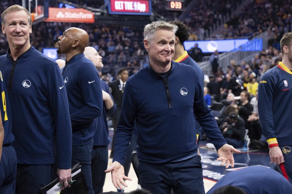 Golden State Warriors head coach Steve Kerr stands during the first half of an NBA basketball game against the New York Knicks Saturday, March 15, 2025, in San Francisco. (AP Photo/Benjamin Fanjoy)