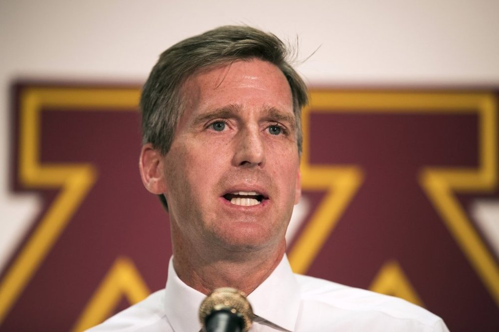 FILE - In this Sept. 7, 2016, file photo, University of Minnesota athletics director Mark Coyle speaks during a press conference, at the Sports Arena in Minneapolis. (Leila Navidi/Star Tribune via AP)