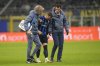 Inter Milan's Piotr Zielinski, centre, leaves the pitch after an injury during the Serie A soccer match between Inter Milan and Monza at the San Siro stadium in Milan, Italy, Saturday, March 8, 2025. (AP Photo/Luca Bruno)