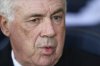 Real Madrid's head coach Carlo Ancelotti sits on the bench before a Spanish La Liga soccer match between Villarreal and Real Madrid in Villarreal, Spain, Saturday, March 15, 2025. (AP Photo/Alberto Saiz)