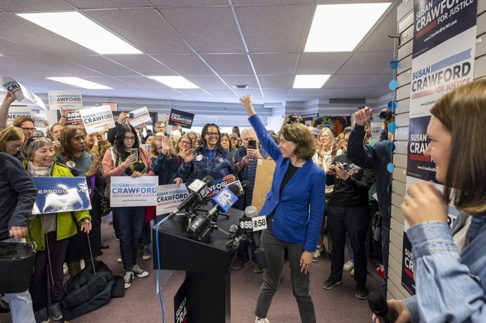 Wisconsin Supreme Court candidate Susan Crawford greets well wishes Saturday, March 29, 2025 at a campaign stop at a field office for the Democratic Party of Wisconsin, in Milwaukee. (AP Photo/Andy Manis)
