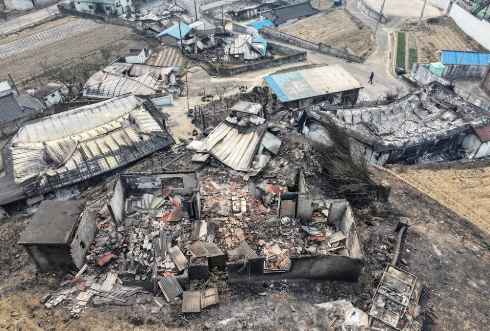 Burnt-out houses are seen at a damaged village due to wildfires in Yeongyang, South Korea, Wednesday, March 26, 2025. (Yun Kwan-shik/Yonhap via AP)