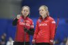 Canada's skip Rachel Homan talks to Sarah Wilkes during the match against Denmark at the World Women's Curling Championship in Uijeongbu, South Korea, Monday, March 17, 2025. (AP Photo/Lee Jin-man)