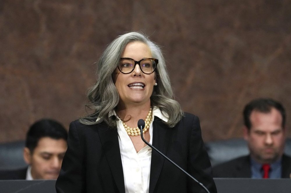 FILE - Arizona Democratic Gov. Katie Hobbs gives the State of the State address in the House of Representatives at the Capitol on Jan. 13, 2025, in Phoenix. (AP Photo/Ross D. Franklin, File)