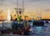 Fireworks explode as boats loaded with traps head from the harbour in West Dover, N.S. on Monday, Nov. 30, 2020 as the lobster fishing season on Nova Scotia's South Shore opens. THE CANADIAN PRESS/Andrew Vaughan