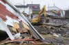 Meteorologists and scientists say sweeping cuts to the National Oceanic and Atmospheric Administration in the United States will be felt in Atlantic Canada — particularly during hurricane season. A heavy machinery operator continues the cleanup from post-tropical storm Fiona in Port aux Basques, N.L., on Thursday, Sept. 29, 2022. THE CANADIAN PRESS/Frank Gunn