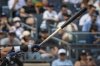 New York Yankees' Aaron Judge hits a home run with one of the team's newly-made torpedo-shaped bats in a baseball game against the Milwaukee Brewers, Saturday, March 29, 2025, in New York. (AP Photo/Angelina Katsanis)