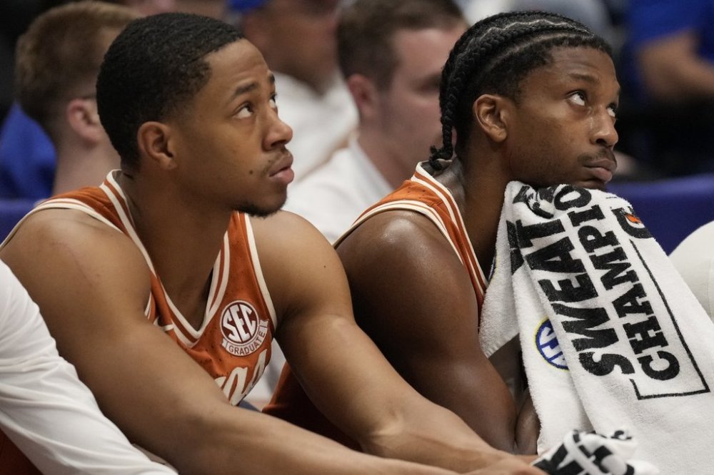 The Texas bench watches play against the Tennessee during the second half of an NCAA college basketball game in the quarterfinal round of the Southeastern Conference tournament, Friday, March 14, 2025, in Nashville, Tenn. (AP Photo/George Walker IV)