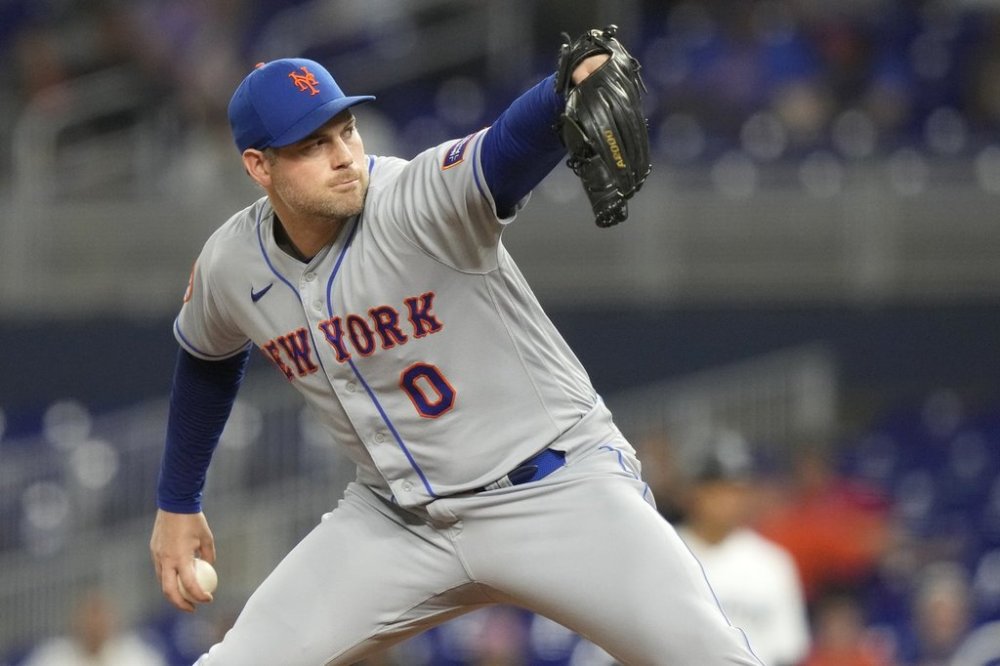 FILE - New York Mets relief pitcher Adam Ottavino throws during the ninth inning of a baseball game against the Miami Marlins, Sept. 18, 2023, in Miami. (AP Photo/Lynne Sladky, File)