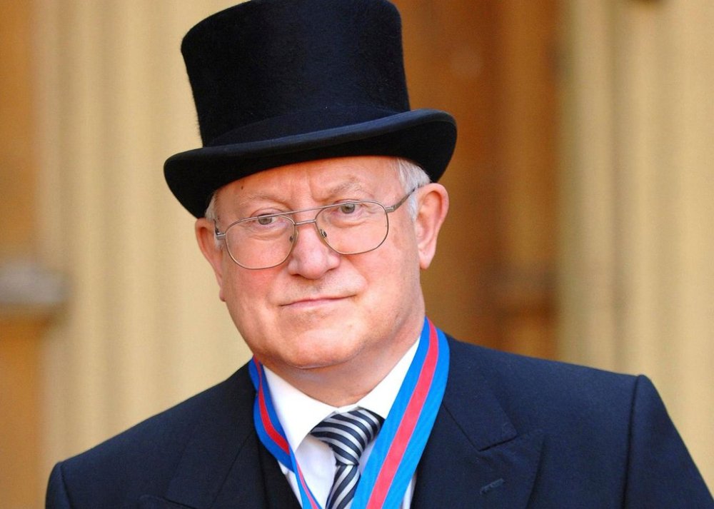 FILE- Former Soviet spy Oleg Gordievsky after receiving the Companion of the Most Distinguished Order of St Michael and Saint George from Queen Elizabeth II at Buckingham Palace in London, Oct. 17, 2007. (Fiona Hanson/PA via AP, file)