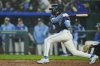 Kansas City Royals' Maikel Garcia watches hit two-run single during the fourth inning of a baseball game against the Baltimore Orioles, Friday, April 4, 2025, in Kansas City, Mo. (AP Photo/Charlie Riedel)