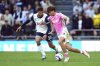 Southampton's Tyler Dibling, right and Tottenham Hotspur's Rodrigo Bentancur vie for the ball, during the English Premier League soccer match between Tottenham Hotspur and Southampton at Tottenham Hotspur Stadium, in London, Sunday April 6, 2025. (Bradley Collyer/PA via AP)