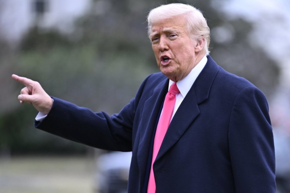 President Donald Trump responds to reporters as he arrives at the White House after speaking at the Conservative Political Action Conference, CPAC, Saturday, Feb. 22, 2025, in Washington. (AP Photo/John McDonnell)