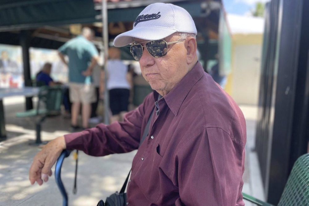 Luis Boulart, 85, poses for a photo in Miami, March 13, 2025. He arrived to the U.S. in 2015 and obtained his citizenship in 2022 casting his first presidential vote for Trump. (AP PhotoAdriana Gomez Licon)