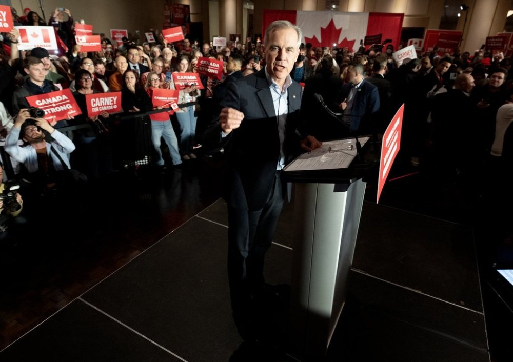 Liberal Leader Mark Carney speaks at an over capacity rally in Kitchener, Ont.. on Wednesday, March 26. THE CANADIAN PRESS/Frank Gunn