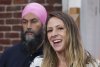 Candidate Ruth Ellen Brosseau responds to a question as NDP Leader Jagmeet Singh looks on during a campaign stop in Yamachiche, Quebec on Sunday, Aug. 29, 2021. THE CANADIAN PRESS/Paul Chiasson
