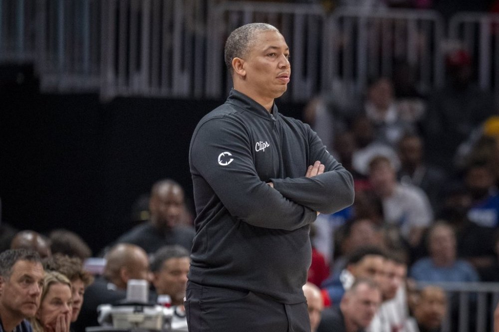 Los Angeles Clippers head coach Tyronn Lue stands on the court during the first half of an NBA basketball game against the Atlanta Hawks, Friday, March 14, 2025, in Atlanta. (AP Photo/Erik Rank)