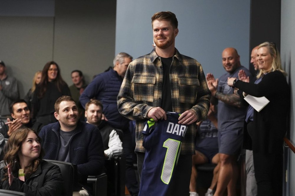 Seattle Seahawks quarterback Sam Darnold arrives for his introductory press conference Thursday, March 13, 2025, at the NFL football team's facilities in Renton, Wash. (AP Photo/Lindsey Wasson)