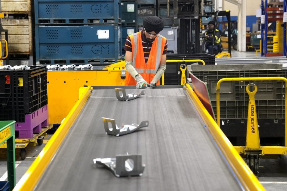 An employee works on the production line at the Martinrea auto parts manufacturing plant, in Woodbridge, Ont., on Monday Feb. 3, 2025. The site supplies auto parts to both Canadian and US auto plants. THE CANADIAN PRESS/Chris Young