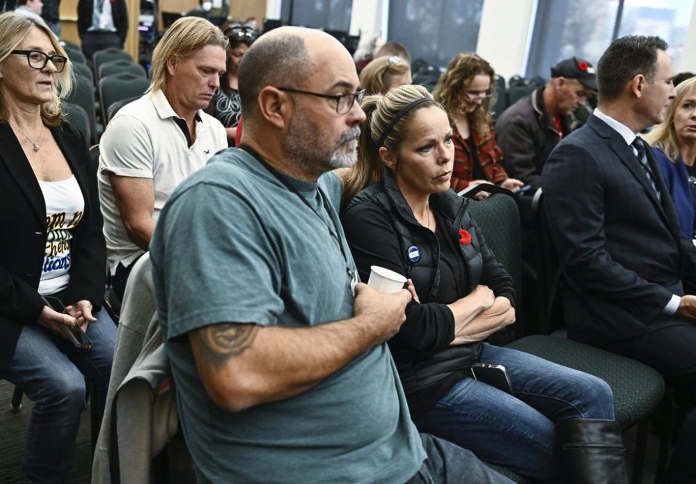 Freedom Convoy organizers Chris Barber and Tamara Lich sit in the gallery as they wait for the start of the day's hearings at the Public Order Emergency Commission, where they were to appear as witnesses, in Ottawa on Wednesday, Nov. 2, 2022. THE CANADIAN PRESS/Justin Tang