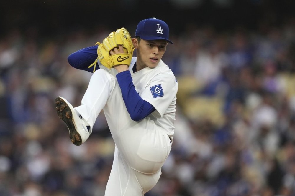 Los Angeles Dodgers pitcher Roki Sasaki throws to the plate during the second inning of a baseball game against the Detroit Tigers Saturday, March 29, 2025, in Los Angeles. (AP Photo/Mark J. Terrill)
