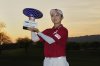 Hyo Joo Kim, of South Korea, holds the champions trophy after the final round of the Ford Championship LPGA golf event, Sunday, March 30, 2025, in Chandler, Ariz. (AP Photo/Matt York)
