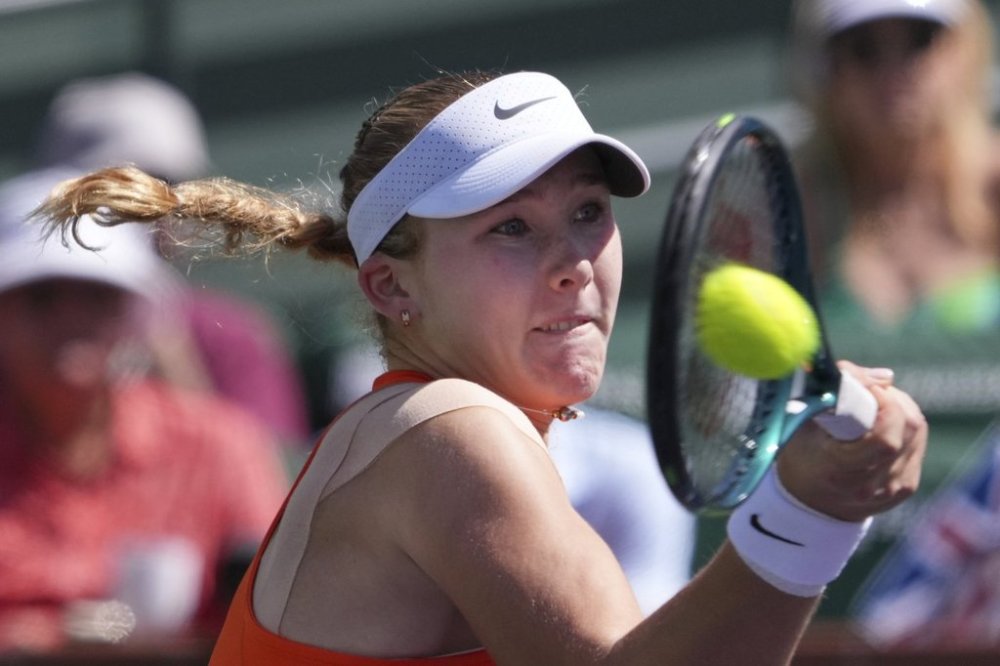 Mirra Andreeva, of Russia, returns to Aryna Sabalenka, of Belarus, during the final match at the BNP Paribas Open tennis tournament Sunday, March 16, 2025, in Indian Wells, Calif. (AP Photo/Mark J. Terrill)
