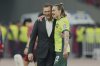 Australia's head coach Tony Popovic, left reacts with Australia's Jackson Irvine after winning a World Cup 2026 group C qualifier match against China held at the Hangzhou Olympic Sports Centre Stadium in Hangzhou, in eastern China's Zhejiang province, on Tuesday, March 25, 2025. (AP Photo)