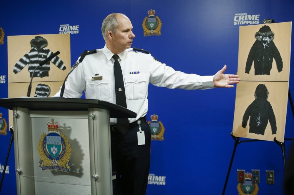 Winnipeg police inspector Shawn Pike shows a jacket that may help identify a woman who was slain by convicted serial killer Jeremy Skibicki in Winnipeg on Dec. 1, 2022. Winnipeg police are to provide an update on the investigation into the woman's death. THE CANADIAN PRESS/John Woods