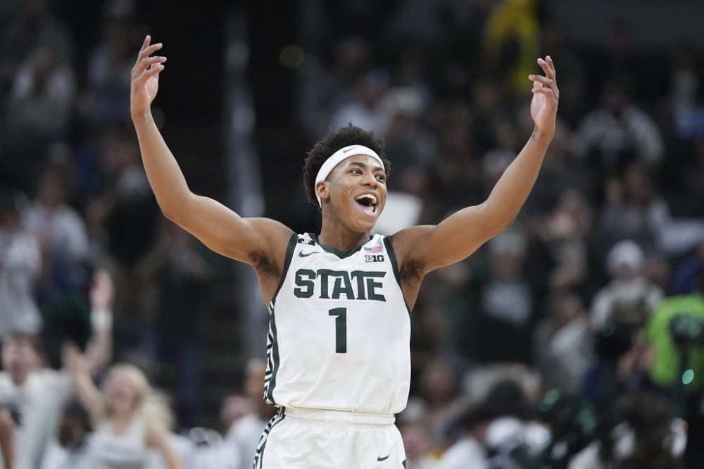Michigan State guard Jeremy Fears Jr. (1) reacts to a basket against Wisconsin during the second half of an NCAA college basketball game in the semifinals of the Big Ten Conference tournament in Indianapolis, Saturday, March 15, 2025. (AP Photo/Michael Conroy)