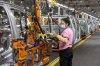 Autoworker Angely Labo works in the body shop producing the Chevrolet Silverado, at the GM Assembly plant in Oshawa, Ontario, on Tuesday, February 22 2022. THE CANADIAN PRESS/Chris Young