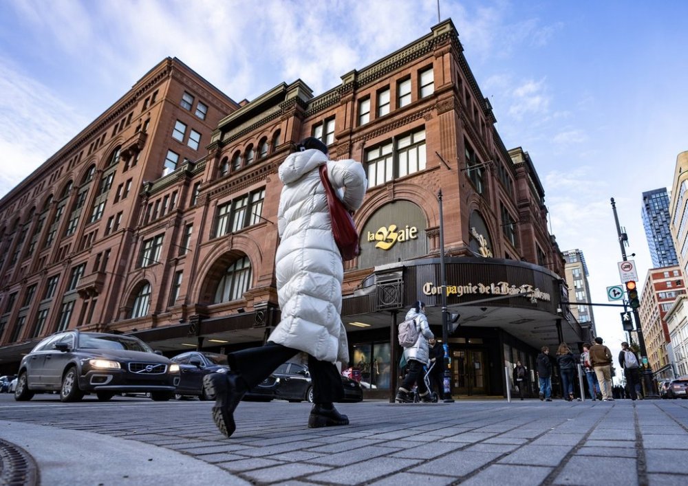 People walk past the Hudson's Bay department store in downtown Montreal on Monday, March 17, 2025. THE CANADIAN PRESS/Christinne Muschi