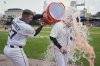 Detroit Tigers' Spencer Torkelson is doused with sports drink by Trey Sweeney (27) after a baseball game against the Chicago White Sox, Sunday, April 6, 2025, in Detroit. (AP Photo/Paul Sancya)