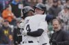 Detroit Tigers' Kerry Carpenter, right, celebrates his two-run home run with Justyn-Henry Malloy (44) against the Chicago White Sox in the second inning during a baseball game, Saturday, April 5, 2025, in Detroit. (AP Photo/Paul Sancya)