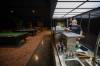 Ruth Bonneville / Free Press
                                Building manager James Kuly preps the bar for opening.