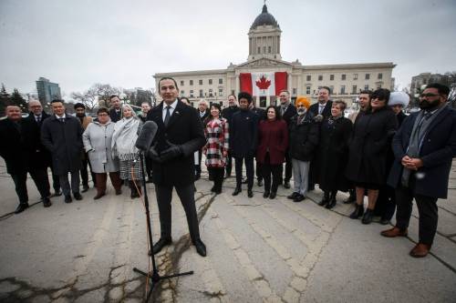 JOHN WOODS / FREE PRESS Manitoba Premier Wab Kinew speaks to media about their response to the US government tariffs outside the Manitoba Legislature Tuesday, March 4, 2025. Reporter: ?