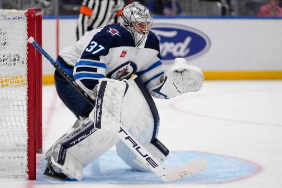 Jets goaltender Connor Hellebuyck will make his 600th NHL appearance tonight. (Frank Franklin II / The Associated Press files)