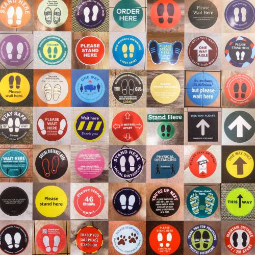MIKE DEAL / FREE PRESS
                                A collage of floor signs promoting social distancing is part of the Manitoba Museum&rsquo;s collection of COVID-related artifacts collected in the spring of 2021.