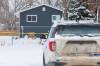 MIKE DEAL / FREE PRESS
                                RCMP officers outside a home on Oak Bay in Portage la Prairie, after a couple were found dead in December.