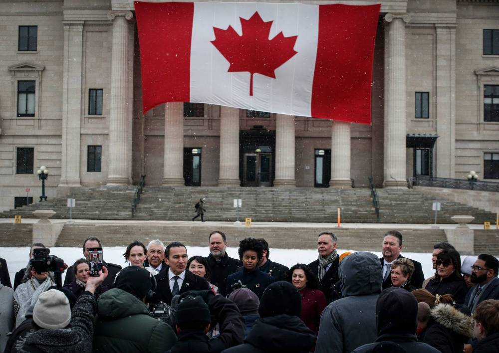 JOHN WOODS / FREE PRESS FILES
                                Manitoba Premier Wab Kinew speaks to media about their response to the US government tariffs outside the Manitoba Legislature Tuesday.