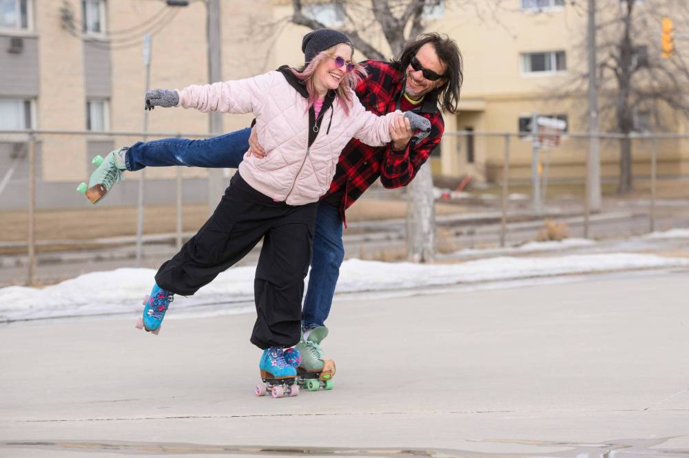 Roller skaters Kelly Smith (left) and Dave Riderenjoyed the spring weather during their skate session at Sargent Park Skatepark Sunday morning. (Mike Sudoma / Free Press)