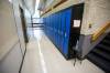 MIKE DEAL / WINNIPEG FREE PRESS A hallway at Darwin School, Wednesday morning where a supplemental HEPA air purifier unit was placed in the gymnasium. The purpose is simply to supplement the air exchange as there is lots of activity in the room. Parents at Darwin School will be relieved to learn the Louis Riel School Division performed an audit of air exchange across schools in 2021-22 to determine where upgrades were necessary. 220907 - Wednesday, September 07, 2022.
