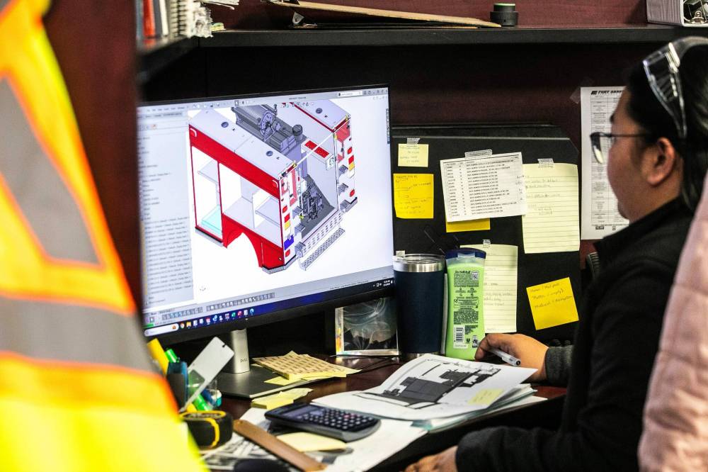 MIKAELA MACKENZIE / FREE PRESS
Designer Frances Manaol works on 3D renderings.