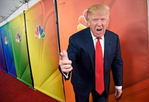 Donald Trump, then host of the television series &ldquo;The Celebrity Apprentice,&rdquo; mugs for photographers at an NBC event in 2015. (Chris Pizzello/Invision/AP)