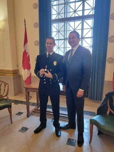 SUBMITTED PHOTO
                                WFPS Lt. Romeo Petit and Premier Wab Kinew had a private meeting in the Manitoba Legislature in January, when Petit received the King Charles III Coronation Medal.