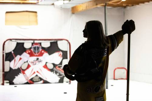 MIKAELA MACKENZIE / FREE PRESS 
                                A nine-year-old boy is caught in the crossfire of a legal battle between his parents and their area&rsquo;s hockey association.