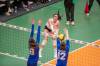 BROOK JONES / FREE PRESS
                                U of M Bisons left side Raya Surinx spikes the ball as Montreal Carabins Florence Cloutier (left) and Julia Lanthier go up for a block during second set action.