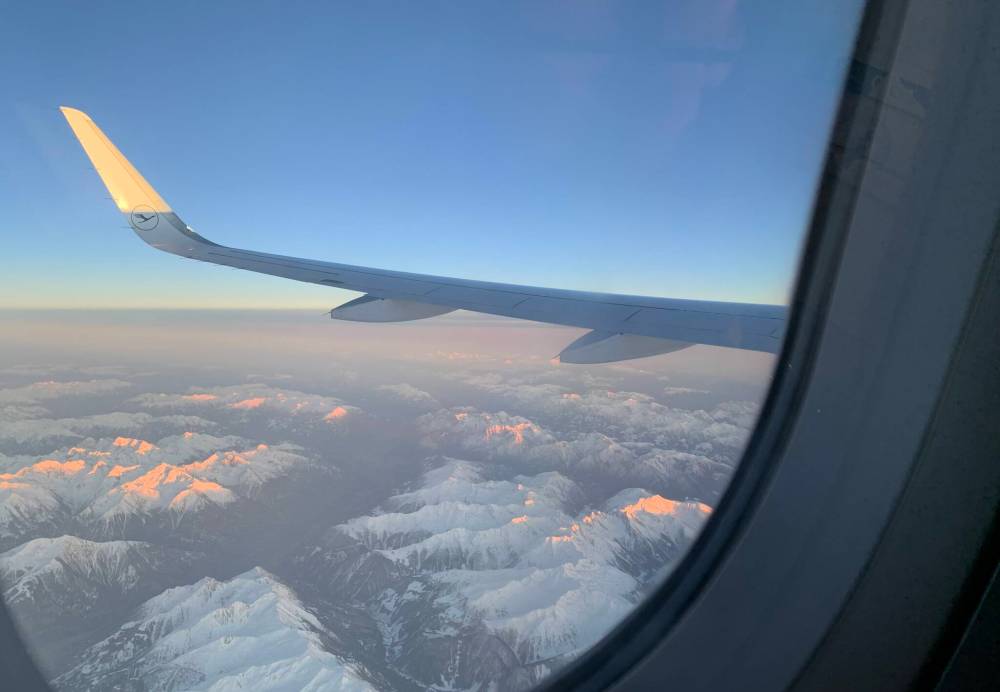 Pam Frampton photo
The sun gives the clouds over the Alps a rosy glow during a blissfully uneventful flight.