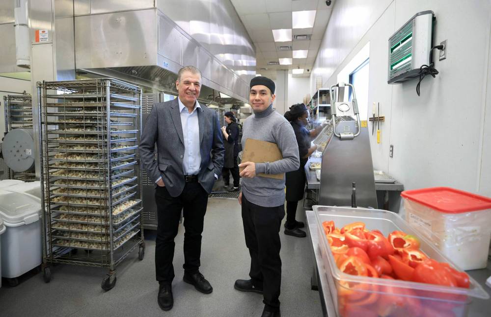 Ruth Bonneville / Free Press
Rob Del Grosso, vice-president operations, and Corey Pierre, operations manager, at Stella’s catering and commissary hub where staff prep food before it is sent out to its various restaurants around the city.